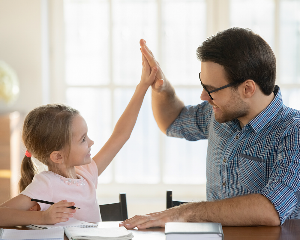 facebook-post-1 Male teacher high fives child they are using adaptive teaching on